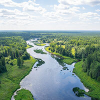 Winding river through green landscape