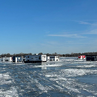 Fish houses on a frozen lake