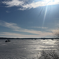 Fish houses on a frozen lake